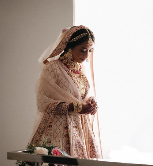Minimalist bridal photoshoot with bride in white,