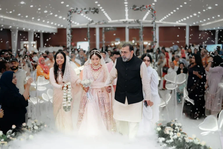 Beautiful bridal entry moment with proud parents on either side