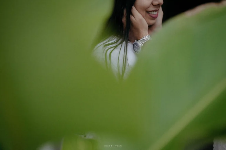 Couple sharing a playful moment during their engagement celebration