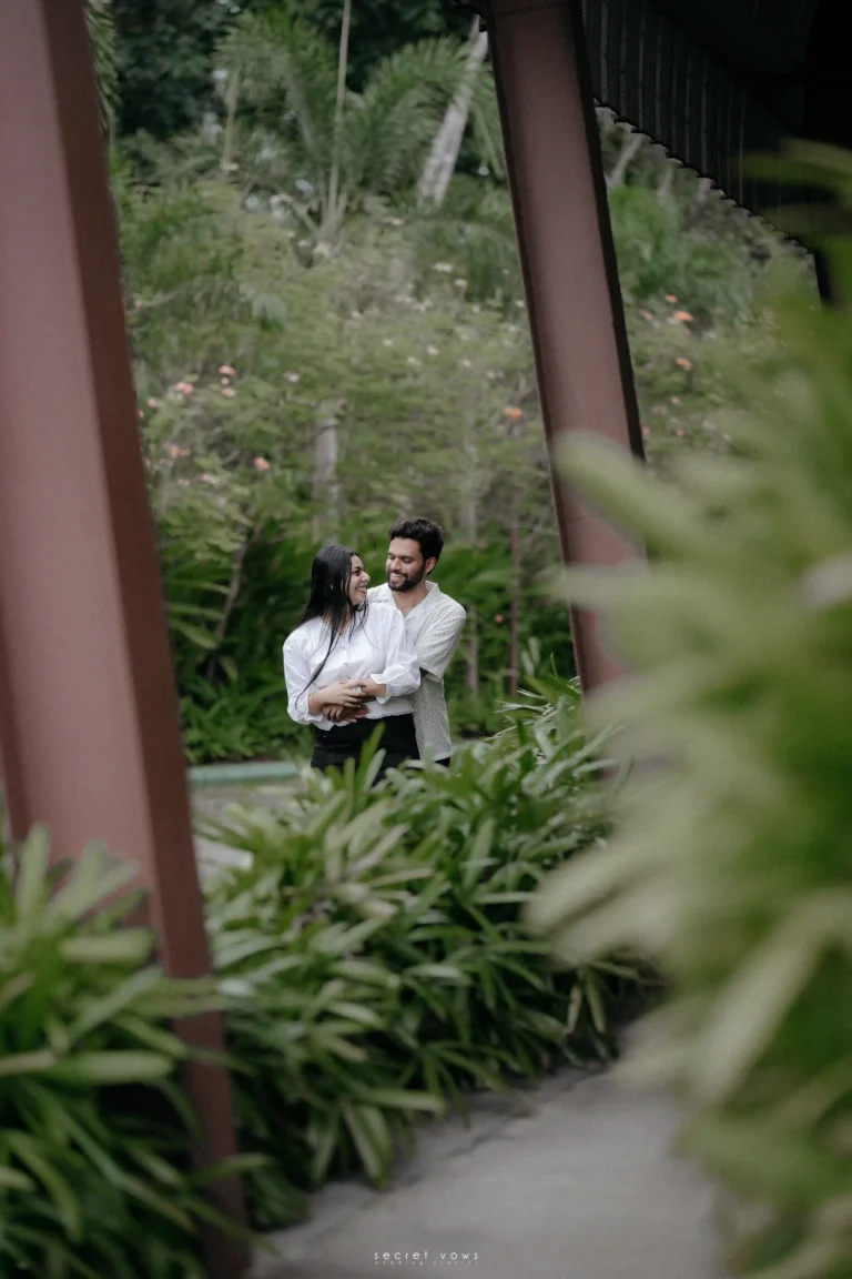 Couple under fairy lights enjoying their Pre-Wedding Photoshoots in Kerala