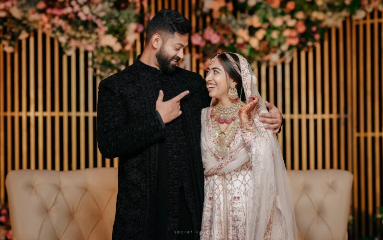 Elegant wedding portrait of bride and groom on stage