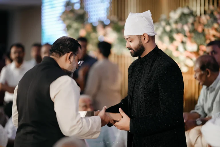 Groom respectfully shaking hands with bride’s father